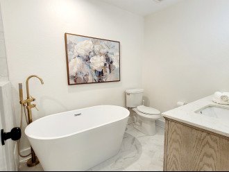 This private ensuite bathroom is luxury.