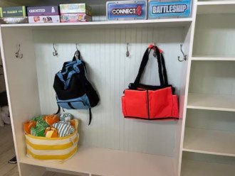 Board games, cards, beach totes and towels (more towels in pool area).