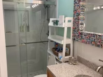 Upstairs bathroom renovated 9/2023. Frameless shower, vanity, toilet.
