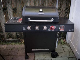 Propane powered BBQ grill located in the west side yard.