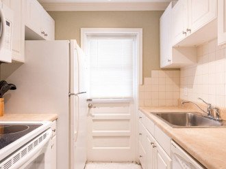 Fully stocked kitchen includes all major appliances (fridge, microwave, stove and dishwasher).