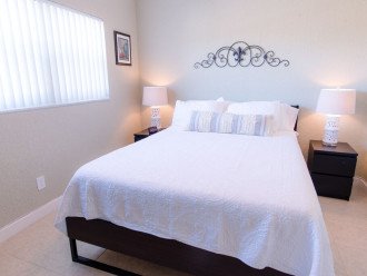 Bedroom includes comfortable queen size memory foam mattress wrapped in high end linens.