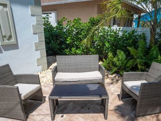 Chill out on the comfortable outdoor furniture in the east side yard