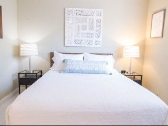 Large en-suite bedroom includes queen Casper memory foam mattress & plush linens