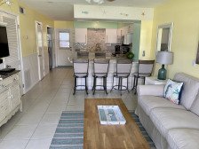Pristine Tropical 2/1.5 Townhouse with Garage Across Street from the Beach