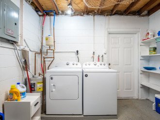Large washer and dryer. Detergent provided.