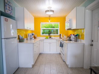 Open concept throughout. We love yellow!