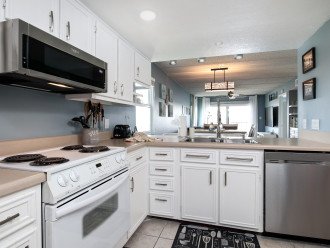 Kitchen opens up to Living Area