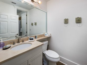 Main level bathroom that can accessed from bedroom and hallway