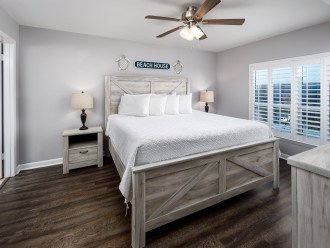 Master bedroom with a king sized bed