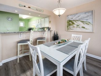 Enjoy a meal together at this spacious dining room table or breakfast bar. The dining room table has a bench seat 6 people.