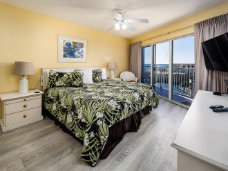 Master Suite features King Size Bed & Balcony Access