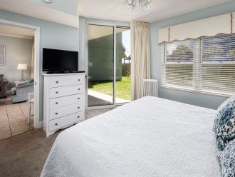 Enjoy the private access to the back deck from the master bedroom