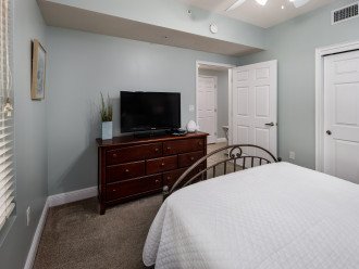 Watch TV from the comfort of the guest bedroom