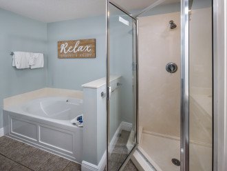 Large bathtub and walk in shower in the master bathroom
