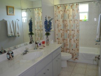 Second full bathroom with a shower-tub