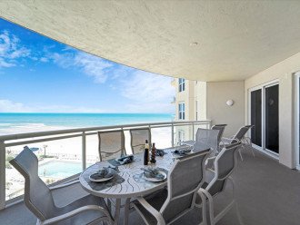 Balcony table with 6 high back chairs & Ocean/Beach View