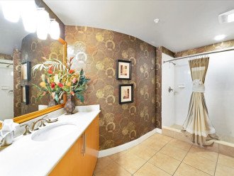 Bath with walk in shower off queen suite