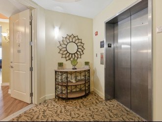 Elevator opens right to into unit Foyer.