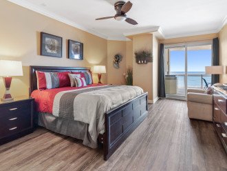 Master Bedroom with King Bed and oceanfront balcony entrance