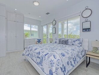 1st level master suite 1 with a King bed.