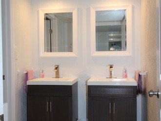 Upstairs bathroom with double sinks