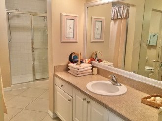 Master bath has a spacious sink area and a stand up shower with glass doors!!!!