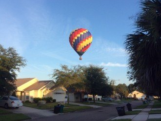 Hot air balloons fly over the house early on weekends