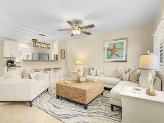 Your vacation starts here! This welcoming living area offers the perfect blend of comfort and style, creating a space where you can truly relax and feel at home.