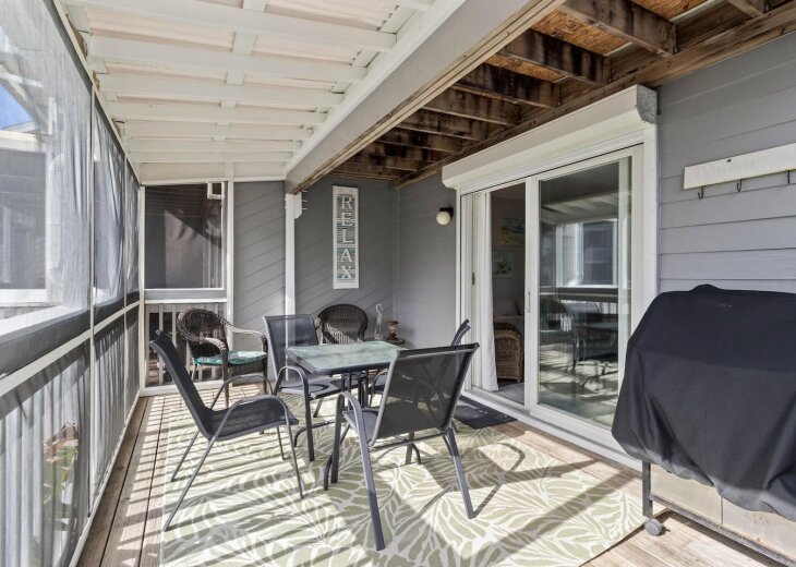 Fire up the gas grill on the screened porch while the table fills up.
