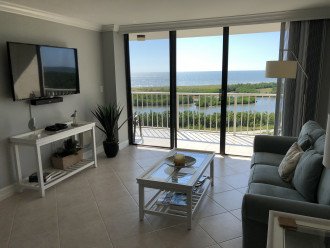 Living Room with 55" Flat Screen TV, Bose Speaker and Great views of the Beach!