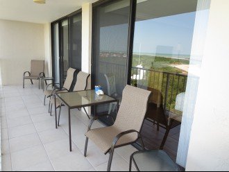 Relax on the balcony enjoy views of the Gulf, Beach & 31 Acre Nature Preserve!