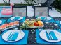 It's time to gather around, enjoy a meal, and share stories from your day at the beach