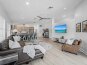 Whether you’re cooking up a meal or unwinding on the sofa, this open layout lets everyone stay connected and enjoy time together