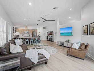 Whether you’re cooking up a meal or unwinding on the sofa, this open layout lets everyone stay connected and enjoy time together