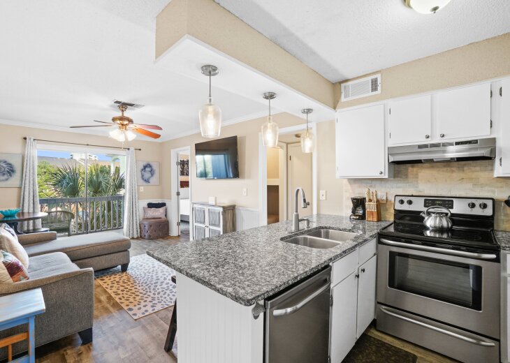 All new fully stocked kitchen. Provides everything needed to eat in. Dinnerware, glassware, utinsils, pots, pans, small appliances, refrigerator, dishwasher and stove/oven.