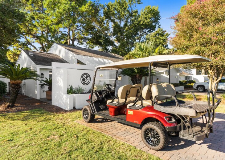 Complimentary 6-Passenger GOLF CART a great way to get around at the beach!