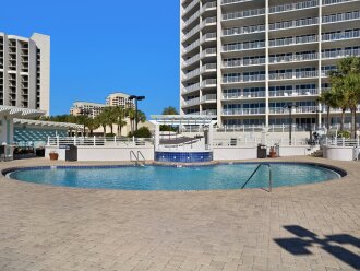 Pool with sundeck and Beach grill on the right.