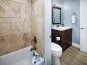 Tub/ shower combo in bathroom