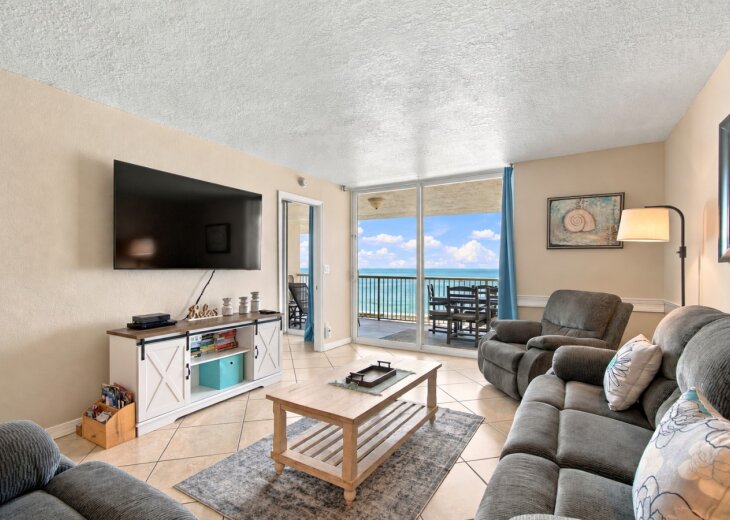 Family room with smart tv and room for the whole family.png