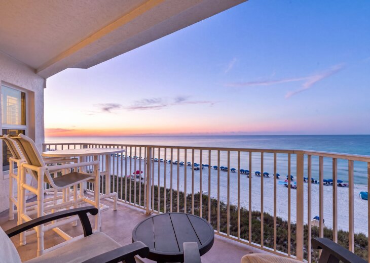 Step onto your private balcony and soak in the breathtaking ocean view as the sun sets, painting the sky in warm hues—your peaceful retreat above the sand.