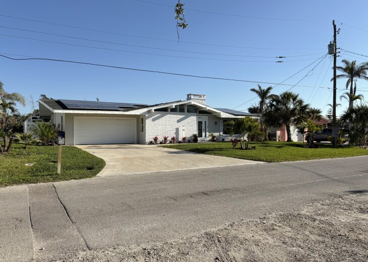 3 Bedroom 1 story home on canal with private pool just steps to Fort Myers beach #1