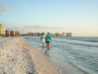 Take a Walk Along Crescent Beach's White Sand and Crystal Blue Water