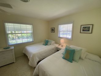 Guest bedroom with two full-size beds