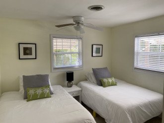 Guest bedroom with two full-size beds