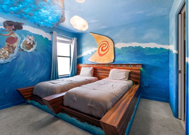 The Moana themed room with two custom twin Moana Raft beds and attached shared bathroom.