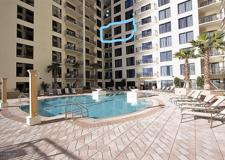 pool with condo circled