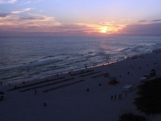 View from 802 sq ft wrap around balcony overlooking Gulf of Mexico at sunset