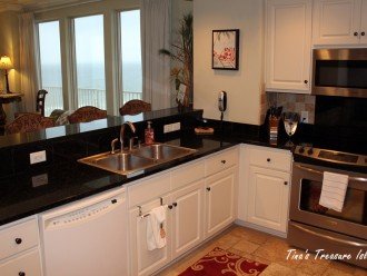 Kitchen with stainless steel appliances, granite counter tops