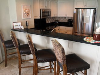 View of our Kitchen with stainless steel appliances, granite counter tops